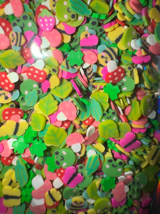 Frogs, bees, butterflies, and leaves mix